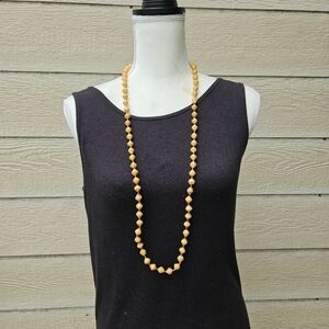 Bead for Life orange paper bead necklace made in Uganda